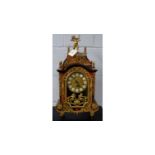 A Continental Louis XIV-style inlaid bracket clock. with Hermle movement.