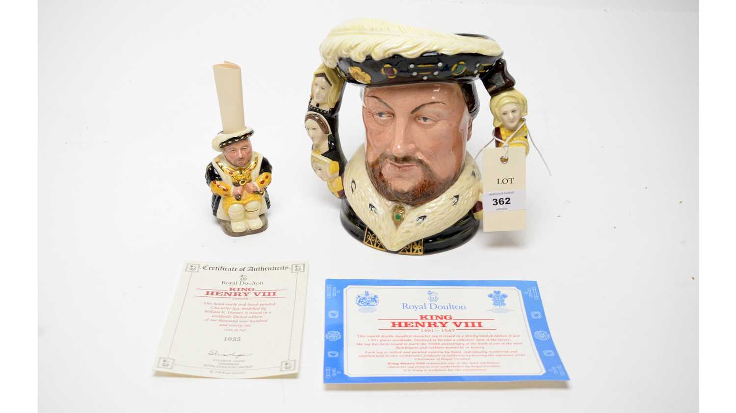 Two Royal Doulton King Henry VIII toby jugs.