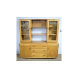 Ercol: a Windsor elm sideboard and display cabinet