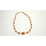 An amber and cultured pearl necklace,