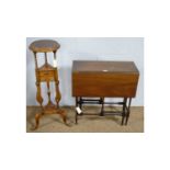 A mahogany spider-legged drop leaf table; and a repro wig/bowl stand.