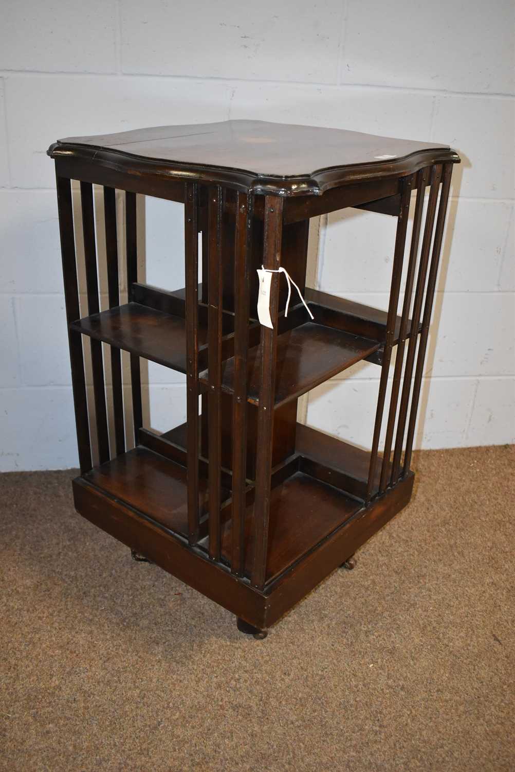 An early 20th Century inlaid mahogany revolving bookcase. - Image 2 of 3