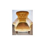 A Victorian button-back armchair, with 'Cope & Collinson patent' castors