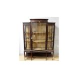 Sopwith & Co., Newcastle upon Tyne: an early 20th C fine quality bowfront display cabinet.