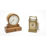 A 19th Century French brass carriage clock; and a miniature mantel clock