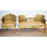 A Louise XV-style bergere conversation settee; and a similarly styled armchair.