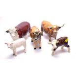 A collection of Beswick cow figures; and ithers