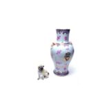 A 20th Century twin handled ceramic vase; and a Staffordshire pug dog figure