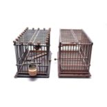 Two 20th Century stained wood bird cages