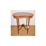 An Edwardian fiddle-back occasional table.