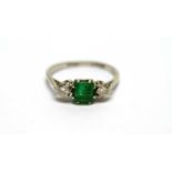 An emerald and diamond ring,