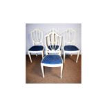 A set of four modern cream-painted Hepplewhite-style dining chairs.