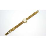 A 9ct yellow gold wristwatch by Everite