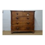A Victorian mahogany and banded chest.