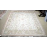 A Zeigler style pink and cream rug.