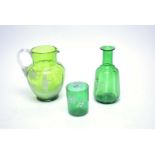 Victorian green glass jug in Mary Gregory-style; a tumbler; and a decanter bottle (no stopper.