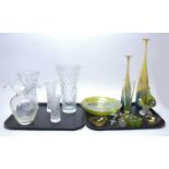 A collection of cut and coloured art glass ware.