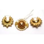 A 9ct yellow gold hollow cast brooch, and two earrings