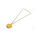 A 9ct yellow gold locket and chain,