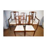 Five Edwardian mahogany salon chairs.