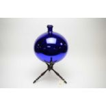A Victorian mirrored blue glass witches ball on stand.