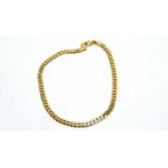 A 9ct yellow gold bracelet of curb links,