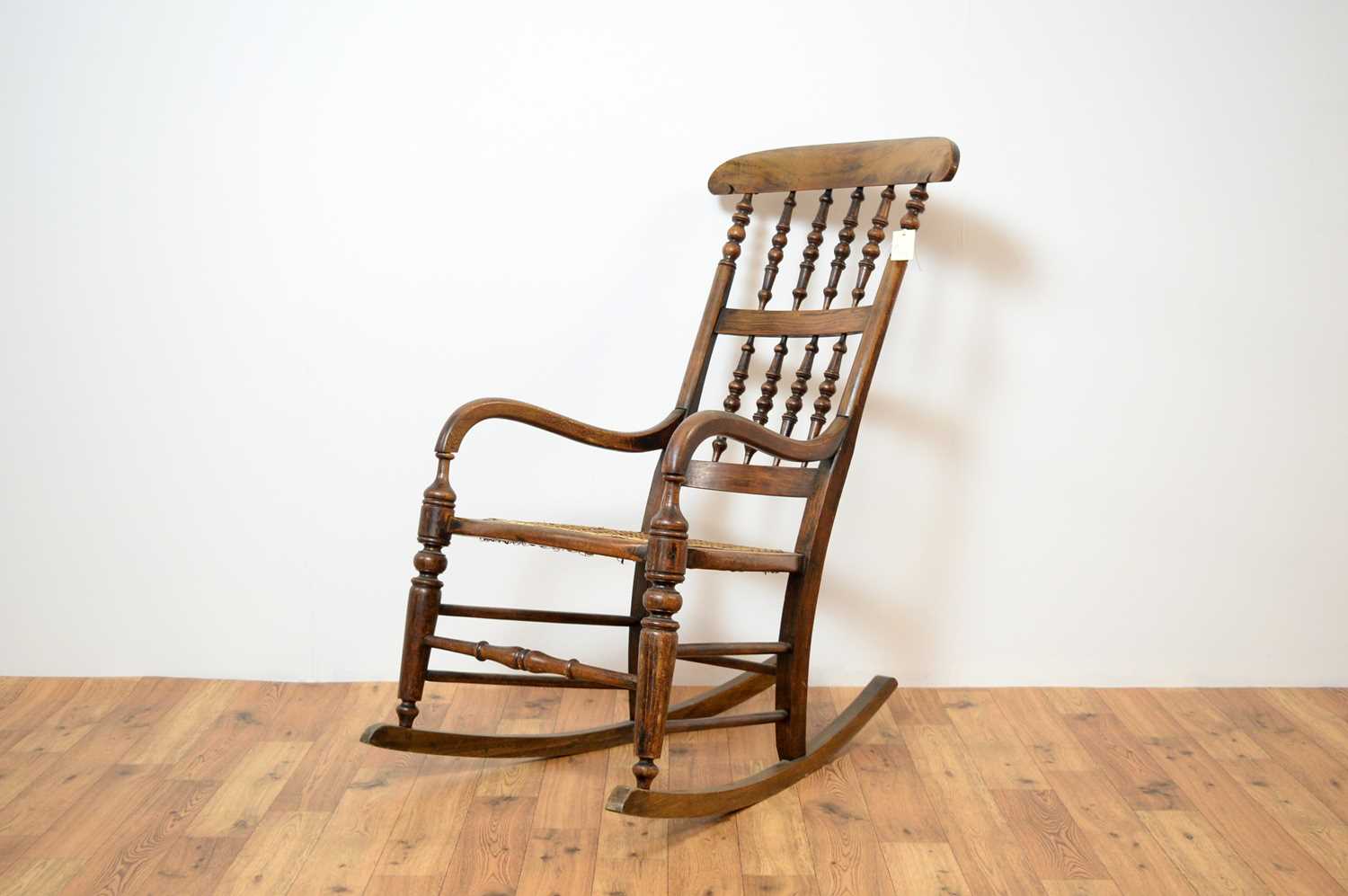 A 20th Century beech and elm rocking chair. - Image 4 of 7