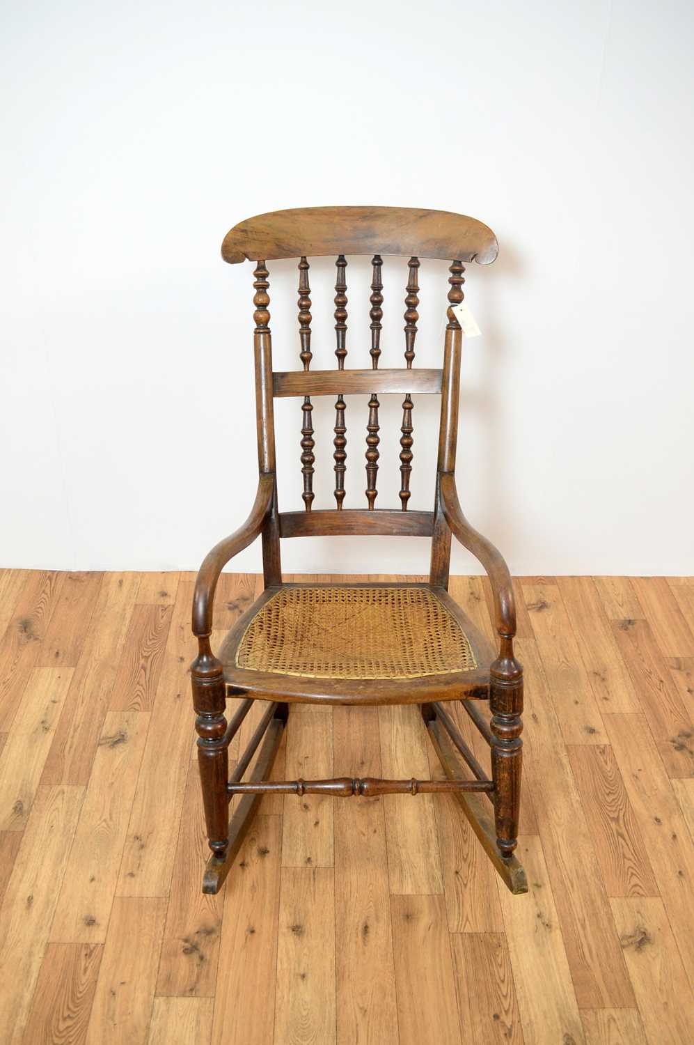 A 20th Century beech and elm rocking chair. - Image 5 of 7