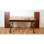 An early 20th Century mahogany extendable dining table of rectangular form