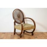 An Art Deco walnut bergere chair