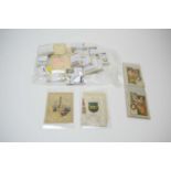A collection of Wills cigarette cards and Kensitas silks.