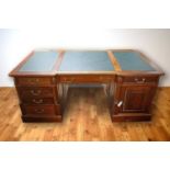 A 20th Century mahogany partners desk