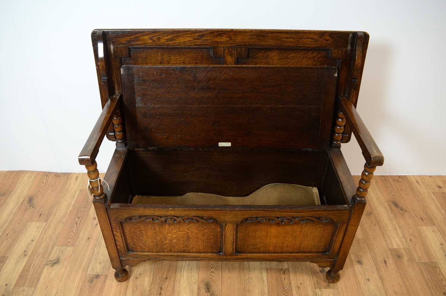 A 20th Century Jacobean Revival oak monks bench - Image 6 of 7