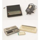 An Acorn Electron computer and a Sinclair ZX81 personal computer