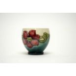 A Moorcroft miniature vase or bowl.