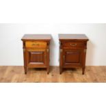 A pair of modern mahogany bedside cabinets