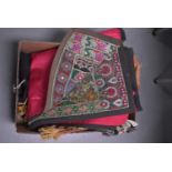 A needlework upholstered and beaded floral tapestry, beadwork tapestry and 2 textiles (4)