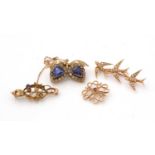 Three Edwardian gold brooches, and a costume brooch.