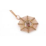An Edwardian 9ct gold spiders web pendant and necklace,