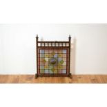 A 20th Century lead lined stain glass fire screen