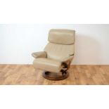 Ekornes Stressless - A vintage 20th Century tan leather stress-less Ekornes reclining armchair