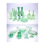 A collection of North East pressed green glassware.