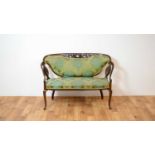 An early 20th Century Edwardian two seater sofa / settle