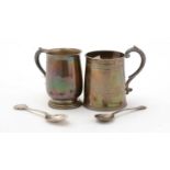 Two silver christening mugs, together with two silver spoons,