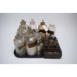 A collection of antique glass apothecary jars.