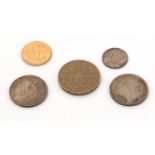 A George V gold half sovereign, 1912; a Queen Victoria shilling, 1886; and other coins.