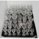 A large selection of drinking glasses.