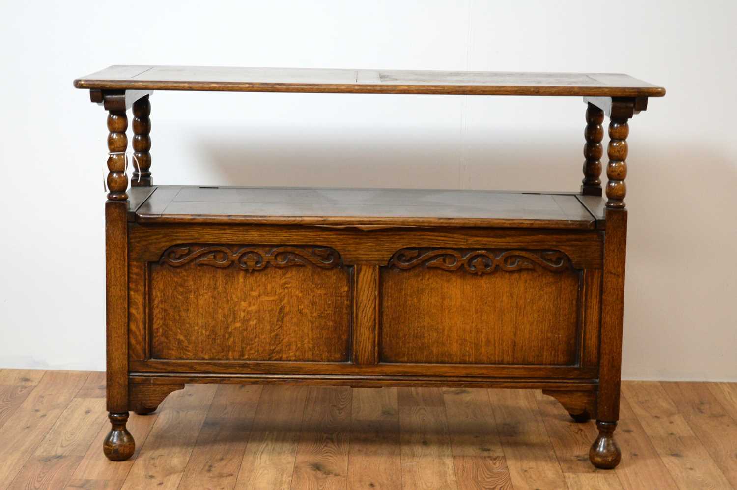 A 20th Century Jacobean Revival oak monks bench - Image 2 of 7