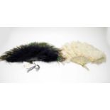 Two ostrich feather hand fans.