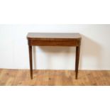 A 19th Century Regency mahogany fold over tea table